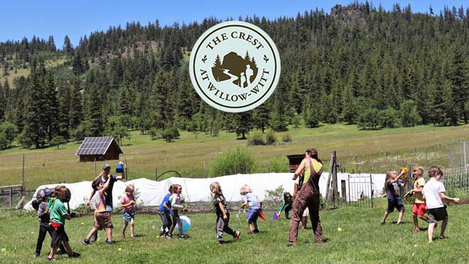 rainbow over Willow-Witt Ranch meadow and buildings