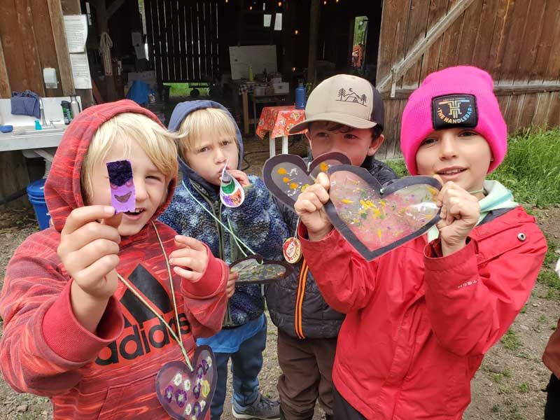 The Crest Nature Day Campers display their crafts