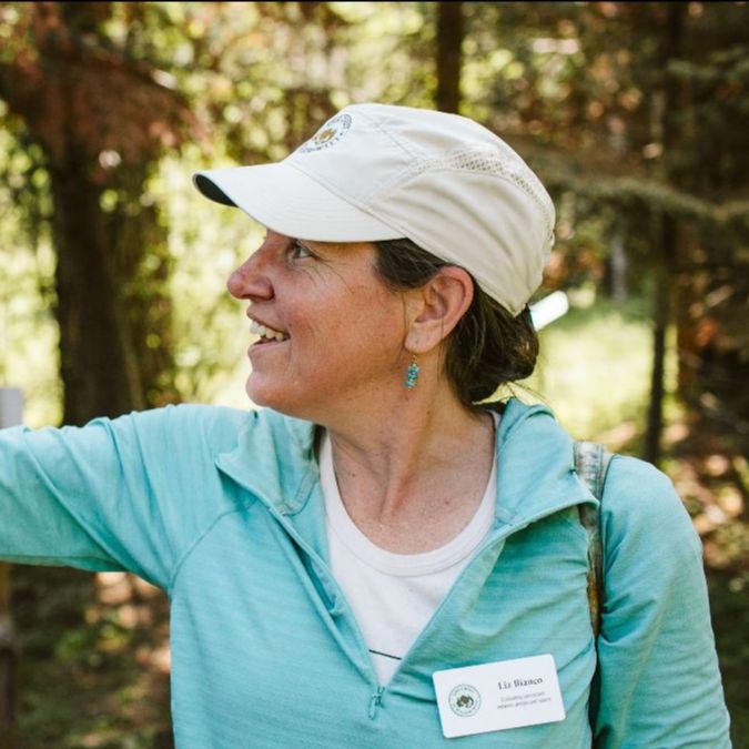 The Crest education coordinator Liz Blanco displays native plant for discussion