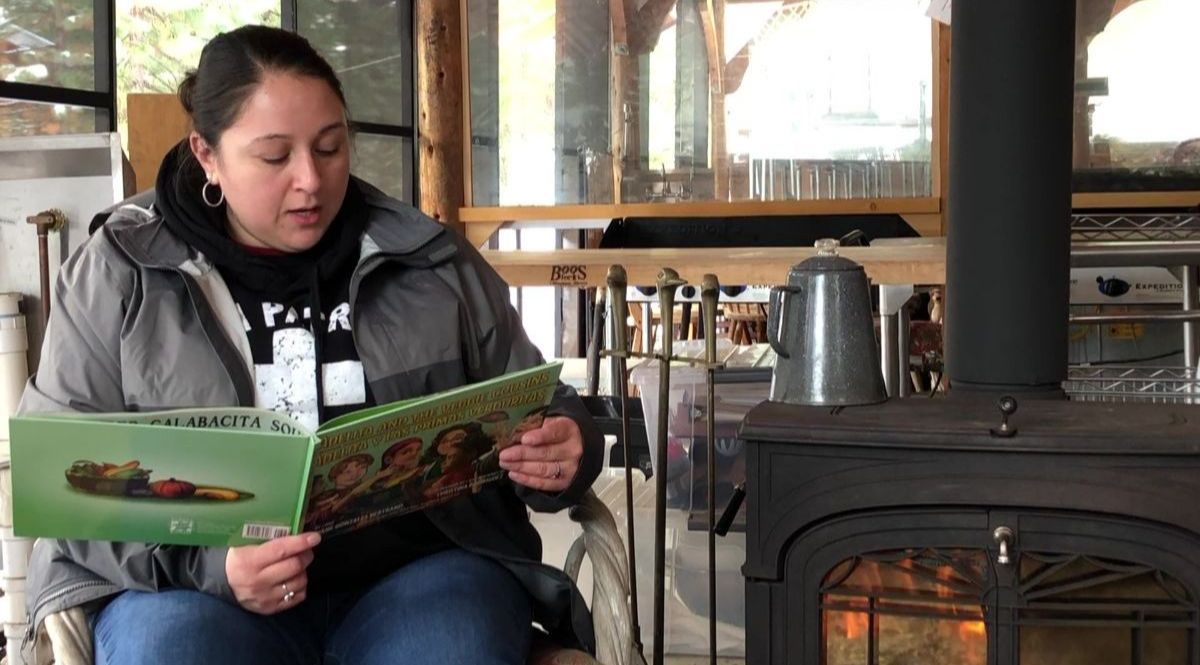 board member Monica Salazar reads for virtual classroom