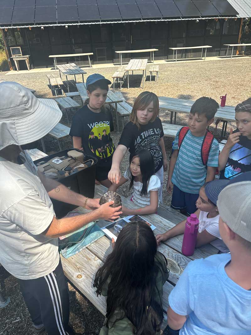 staff teaching students about western pond turtles