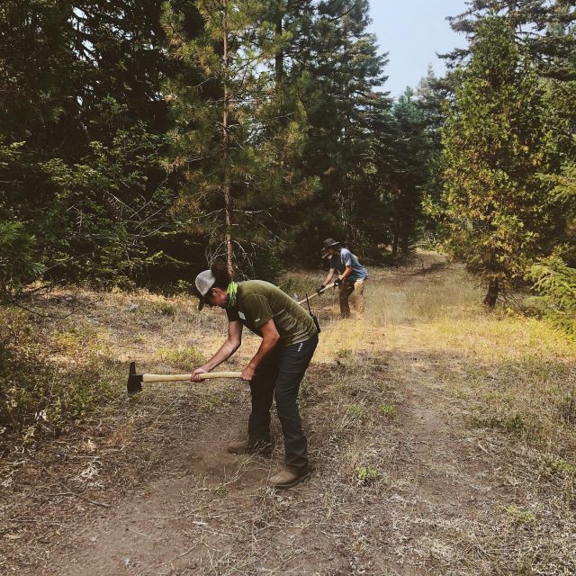 Turtle Trot 2021 5k trail race workers clearing the trail