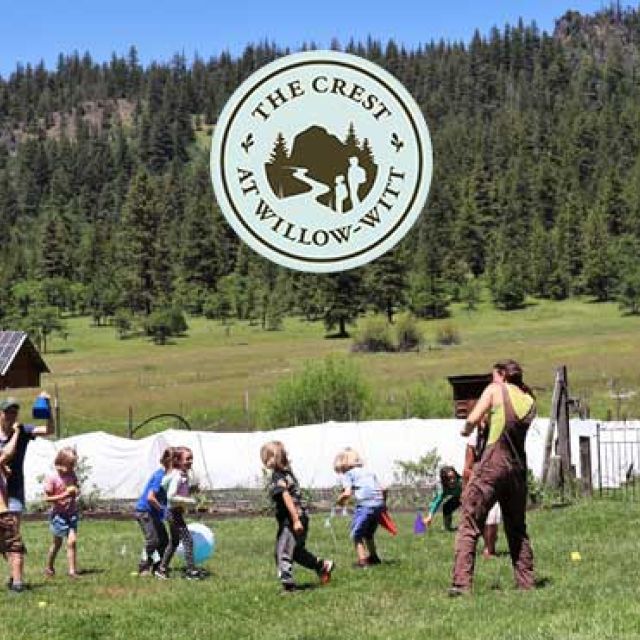 children at The Crest summer camp program playing outdoors at the farm